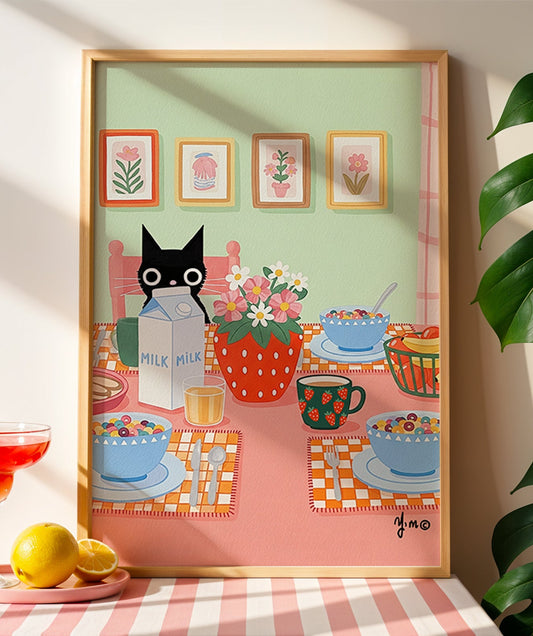 Delightful black cat kitchen art featuring colorful breakfast scene with cereal bowls, flowers, and cookies. Perfect whimsical decor for cozy homes.