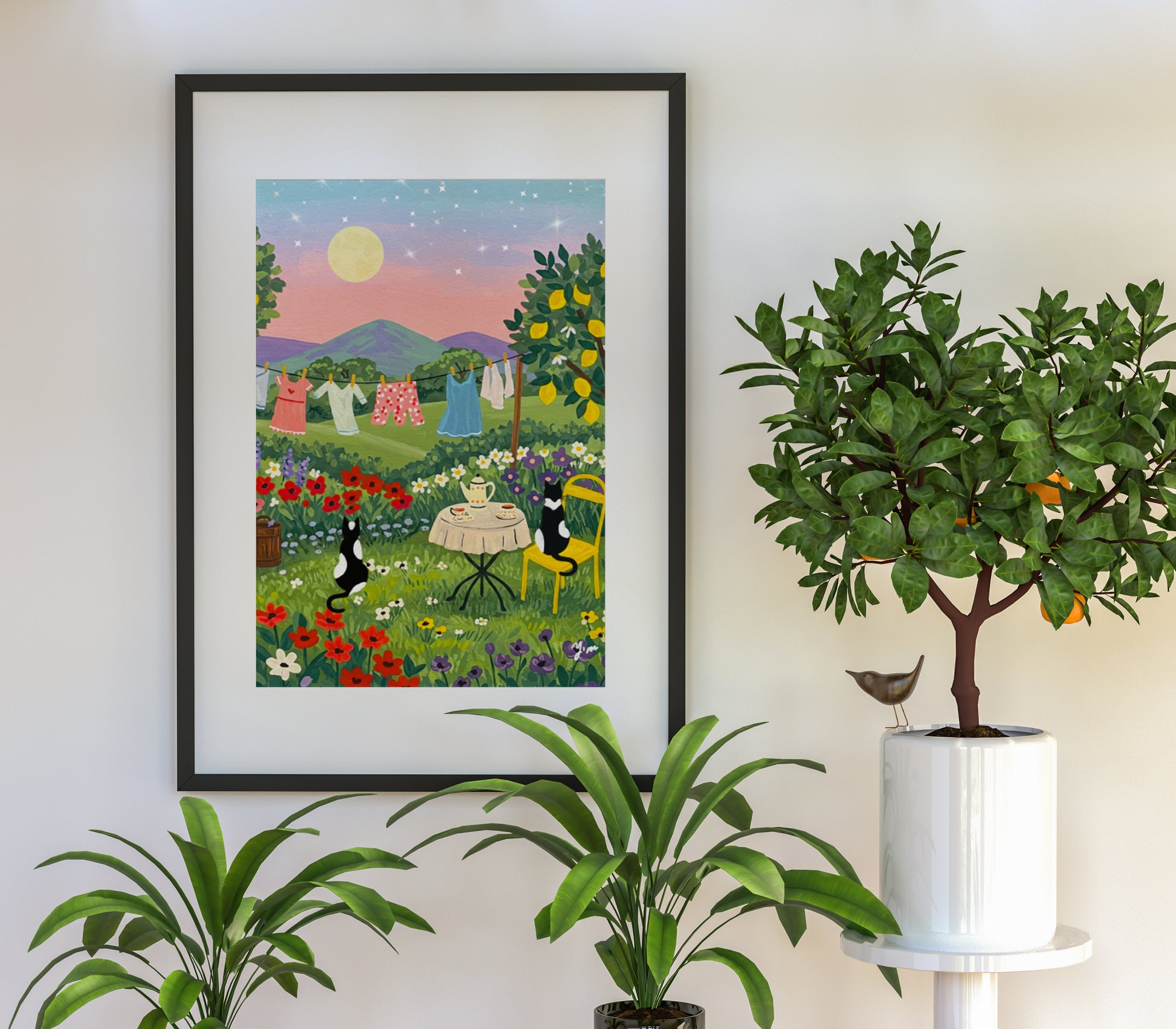 Two cats having tea at sunset with a laundry line in the background and a whimsical landscape scene perfect for cozy home wall decor

