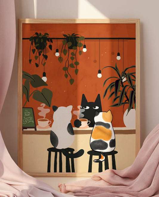 Three cartoon-style cats sit at a café counter sipping coffee. A black cat faces forward with a cup in hand, while a white and black cat and a calico cat sit on bar stools from behind. The warm orange background is decorated with hanging string lights and potted plants, creating a cozy café atmosphere.